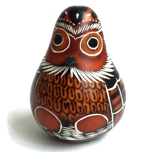<center>Hand-Carved Owl Gourd</br>crafted by Artisans in Peru</br>Measures 2-1/2" high x 2" diameter at base</center>
