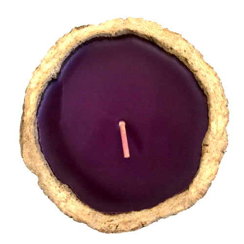 <center>Brazil Nut Pod Candle with Sandalwood Scent Crafted in Peru </br>Measures: ~ 2-1/4" to 2-3/4” high and 4” to 4-1/2” in diameter </br> 